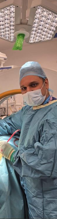 Mr Bhaskar Thakur neurosurgeon and spine specialist
