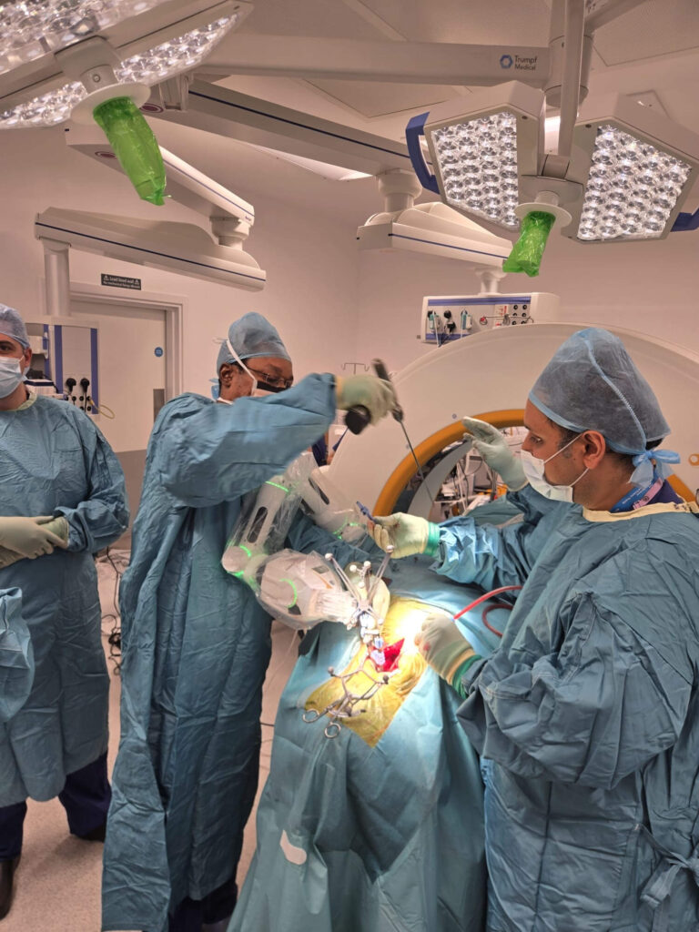 Robotic-assisted spinal surgery procedure in progress