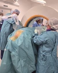 Experienced surgical team performing advanced robotic spine procedures. Experienced surgical team performing advanced robotic spine procedures.